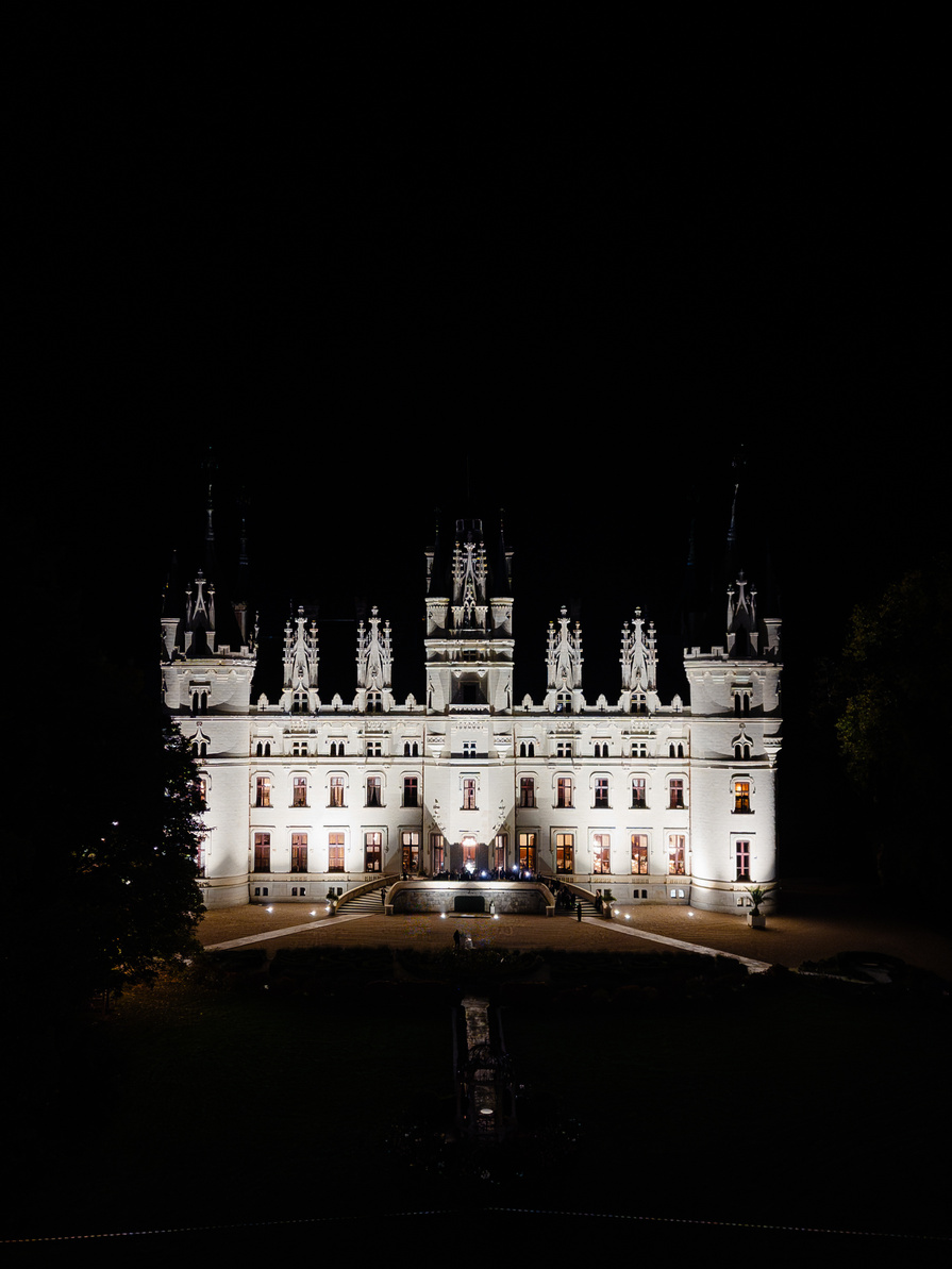 Château Challain lit up at night