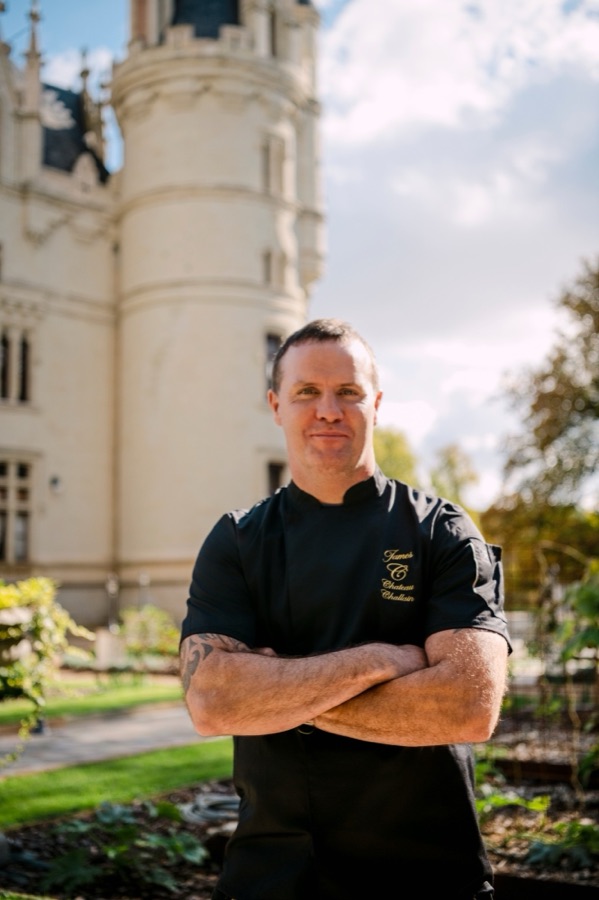 Chef James Sheridan in front of the château tower